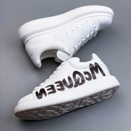 Alexander McQueen - Signature Sneakers in Black and White in 2 Versions
