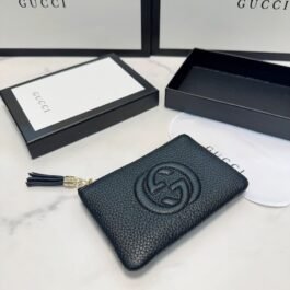 Gucci - Embossed G Wallet size 14x9cm